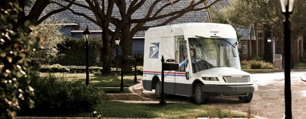 Postal worker in an Oshkosh NGDV fleet vehichle.